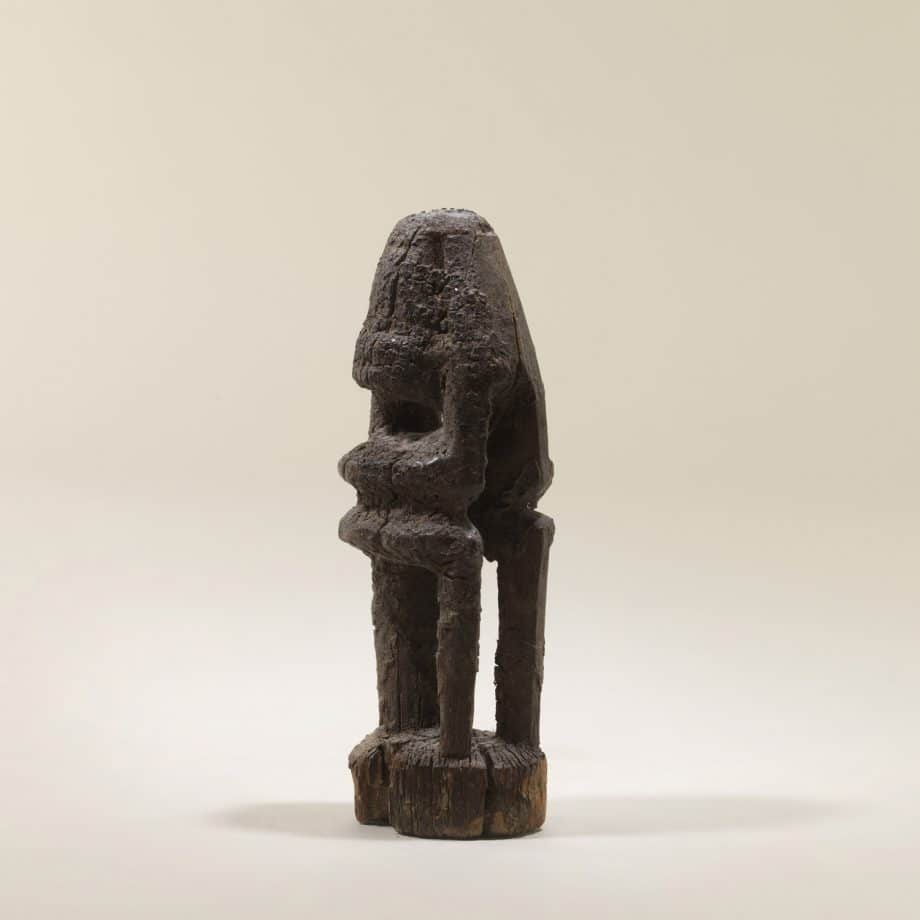 Statuette Dogon Mali personnage assis tête dans les mains