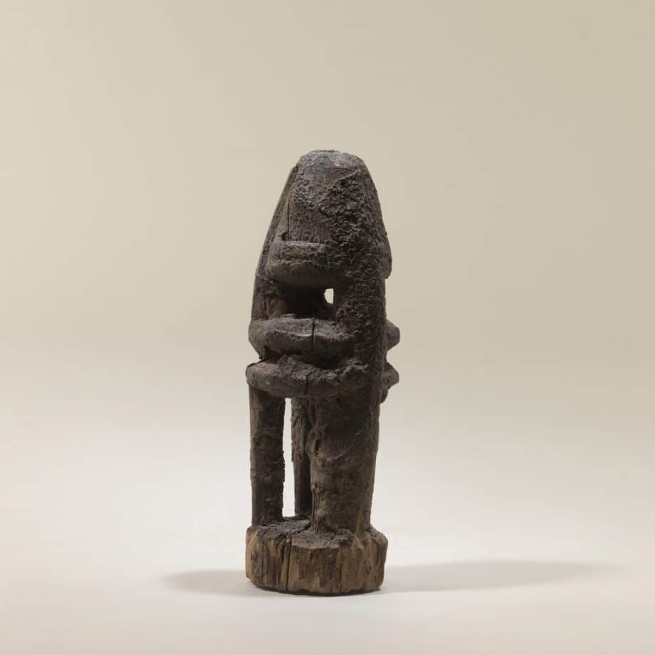 Statuette Dogon Mali personnage assis tête dans les mains